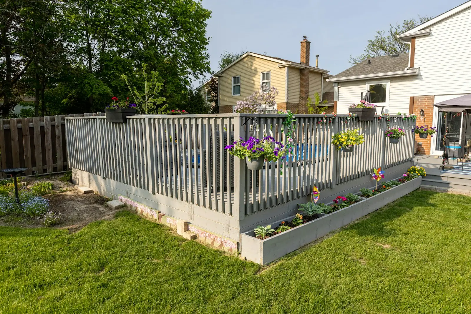 Backyard lawn with raised planter beds