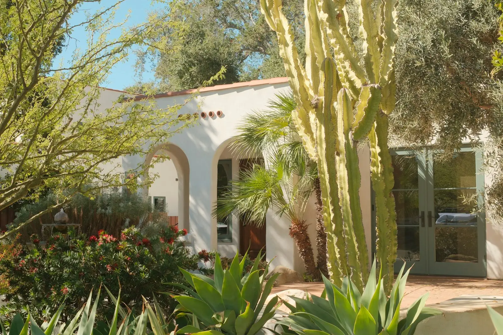 Spanish style home with desert landscaping